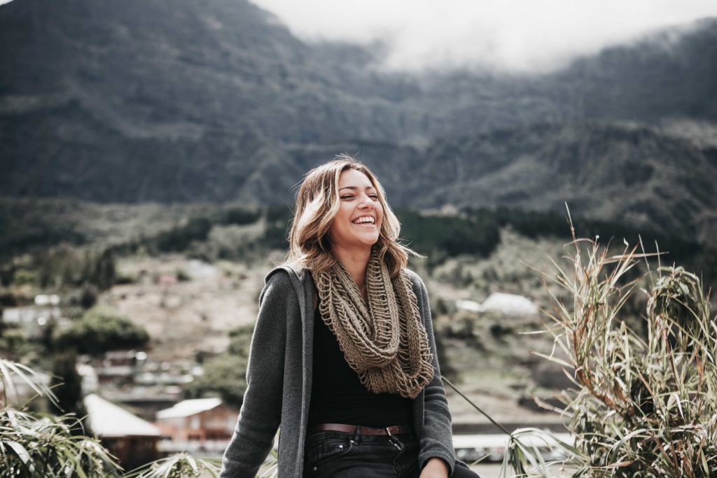 woman laughing outside