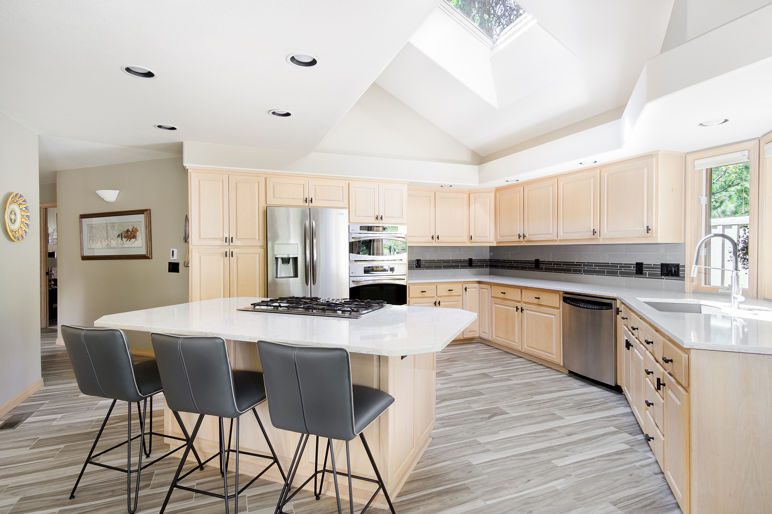 Real estate photograph of open kitchen